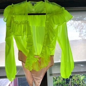 FASHIONNOVA neon yellow ruffle bodysuit with 2 button closure nude bottom.
